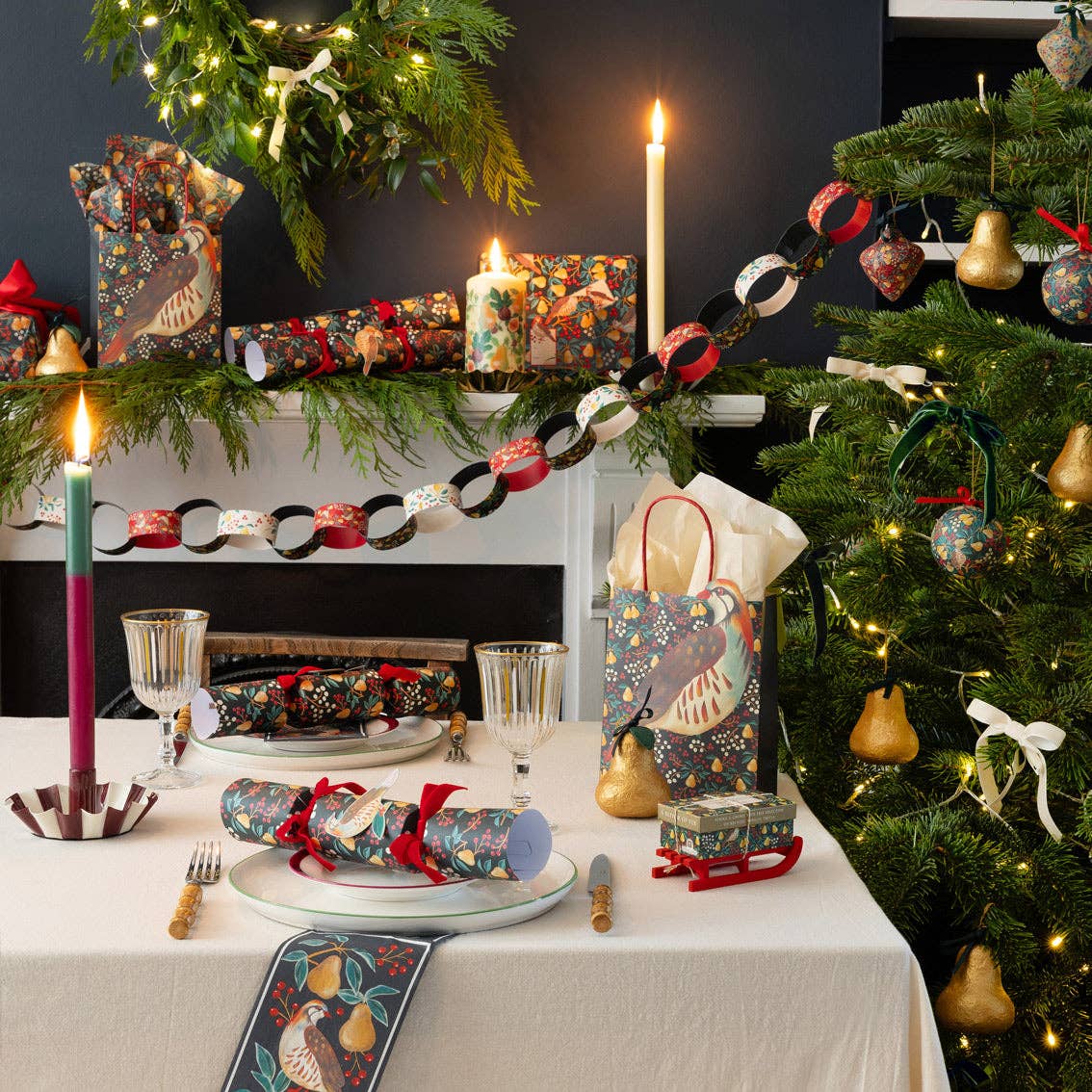 Green velvet bow with long tails on a festive Christmas garland