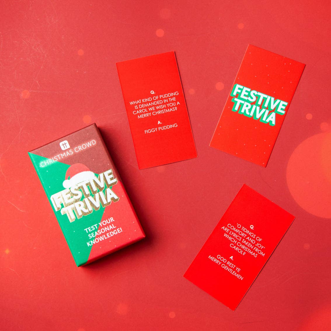 Set of Christmas party game cards in green and red with Festive Trivia text