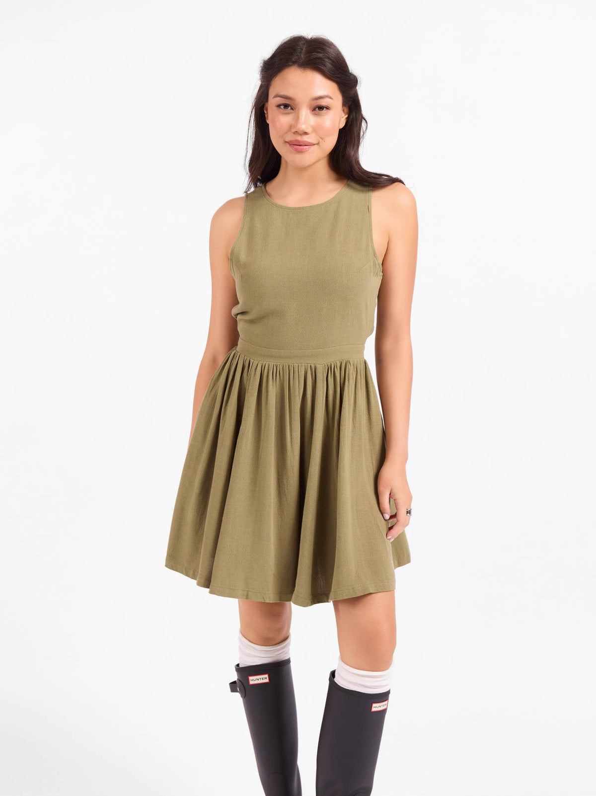 Olive sleeveless mini dress with buttoned back and gathered waist