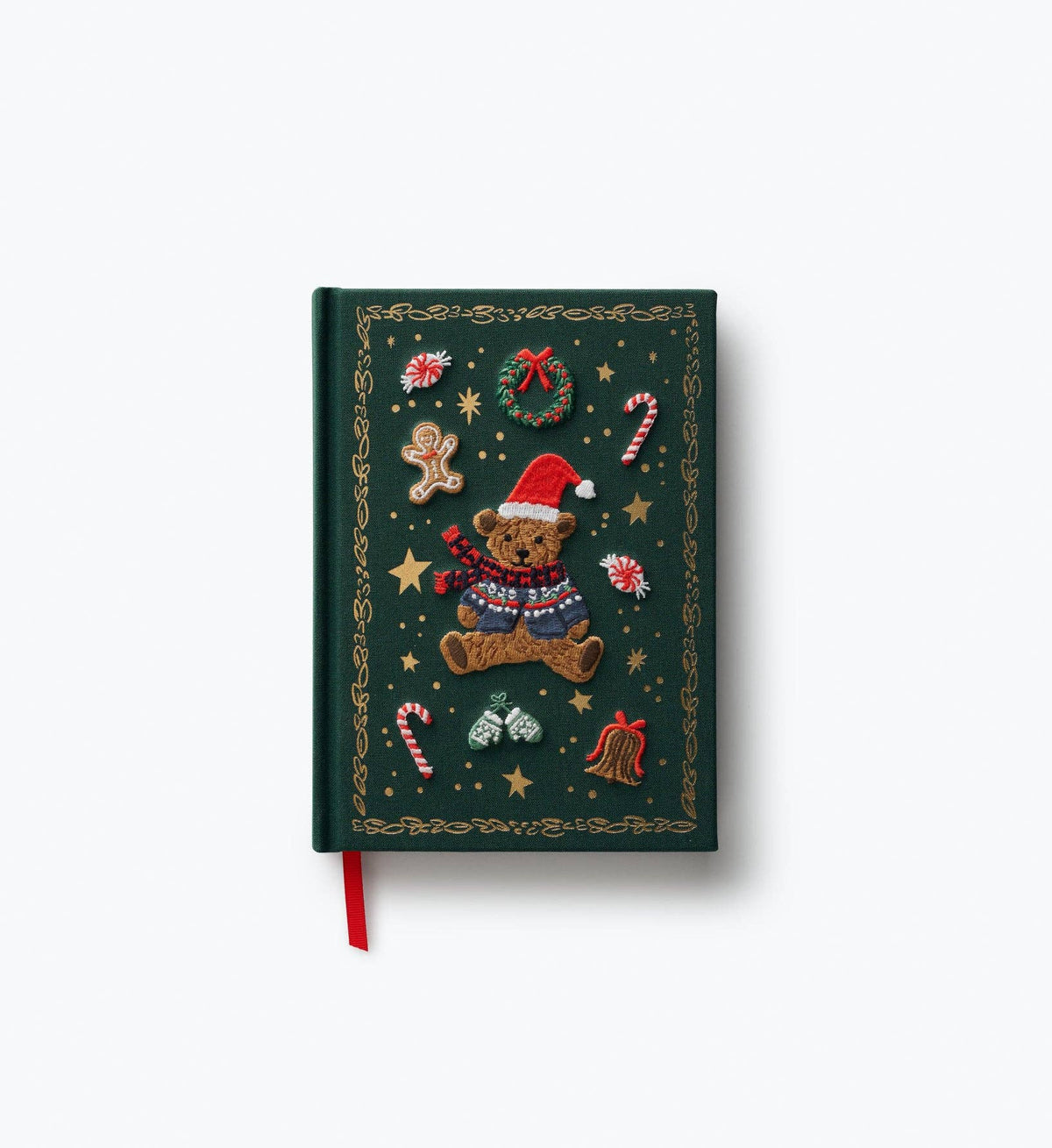 Embroidered Christmas journal with dark green cover, teddy bear, festive ornaments, red ribbon