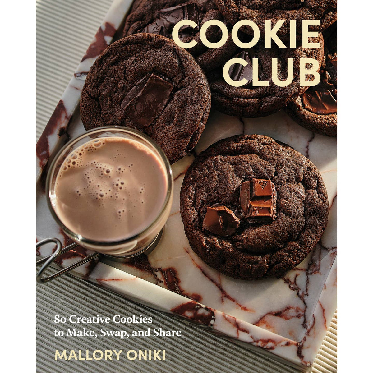 Cookie Club cookbook cover with chocolate cookies and a cup of milk