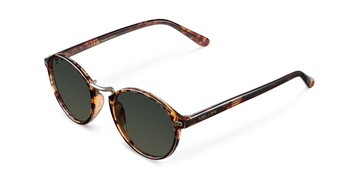 Cat-eye tortoiseshell sunglasses with dark lenses, side profile view