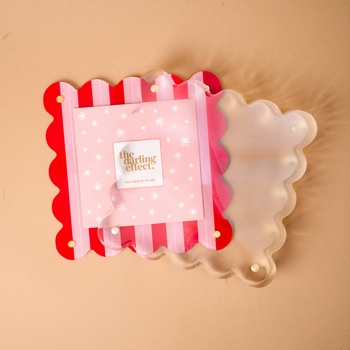 Scalloped acrylic square photo frame showing red-and-white striped back