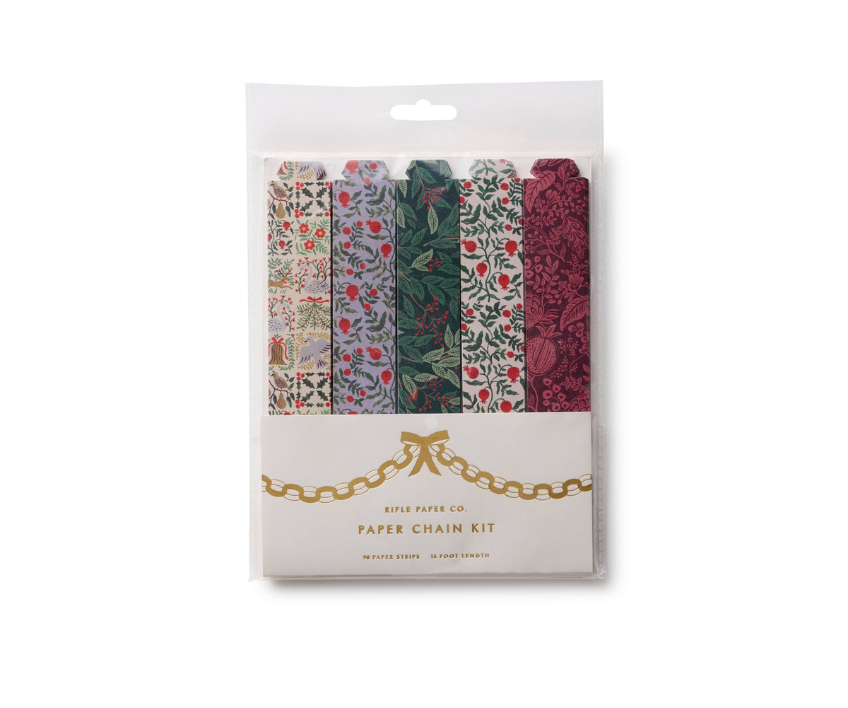 Christmas paper chain kit with patterned paper strips in red, green, and cream