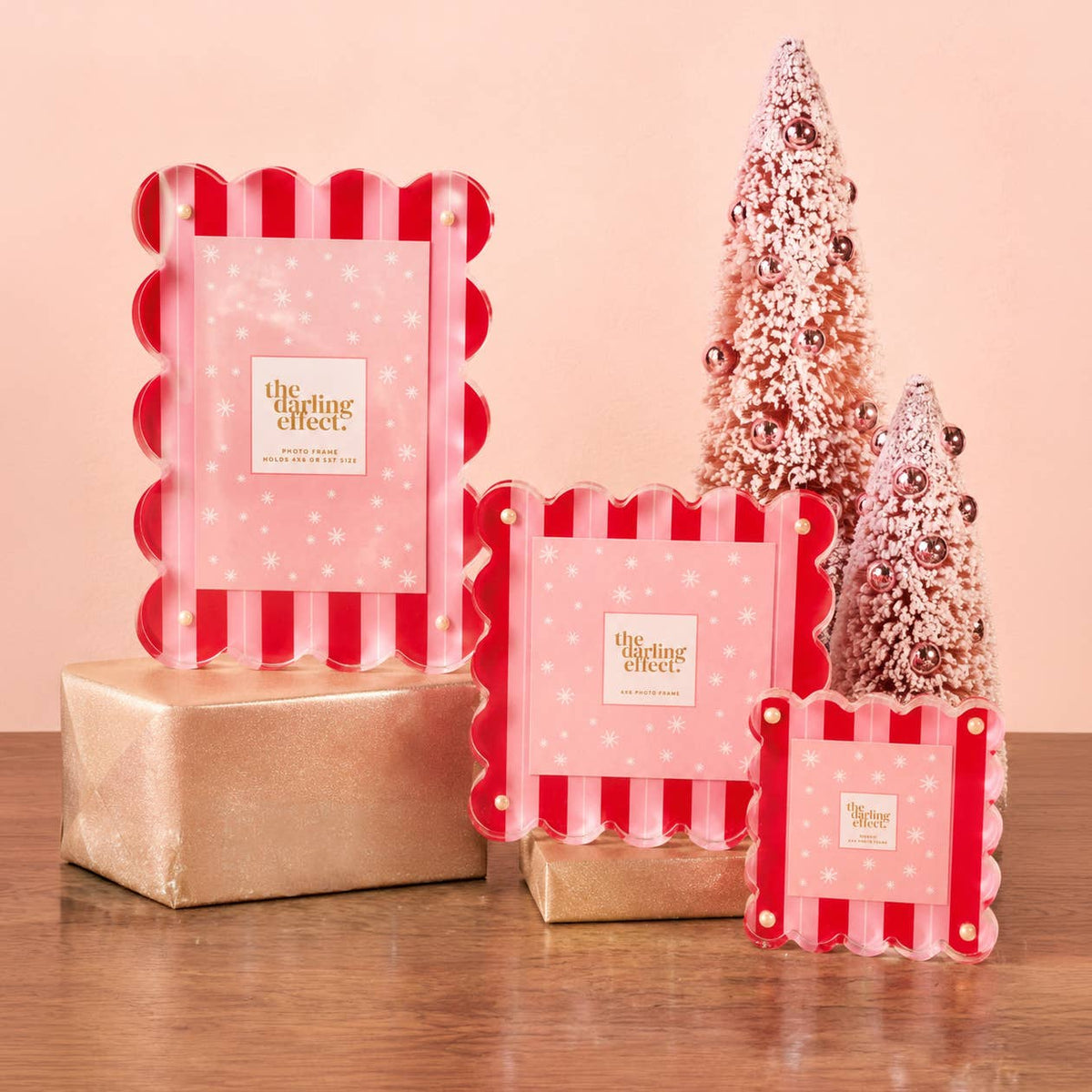 Set of acrylic scalloped square photo frames in red and white peppermint stripes