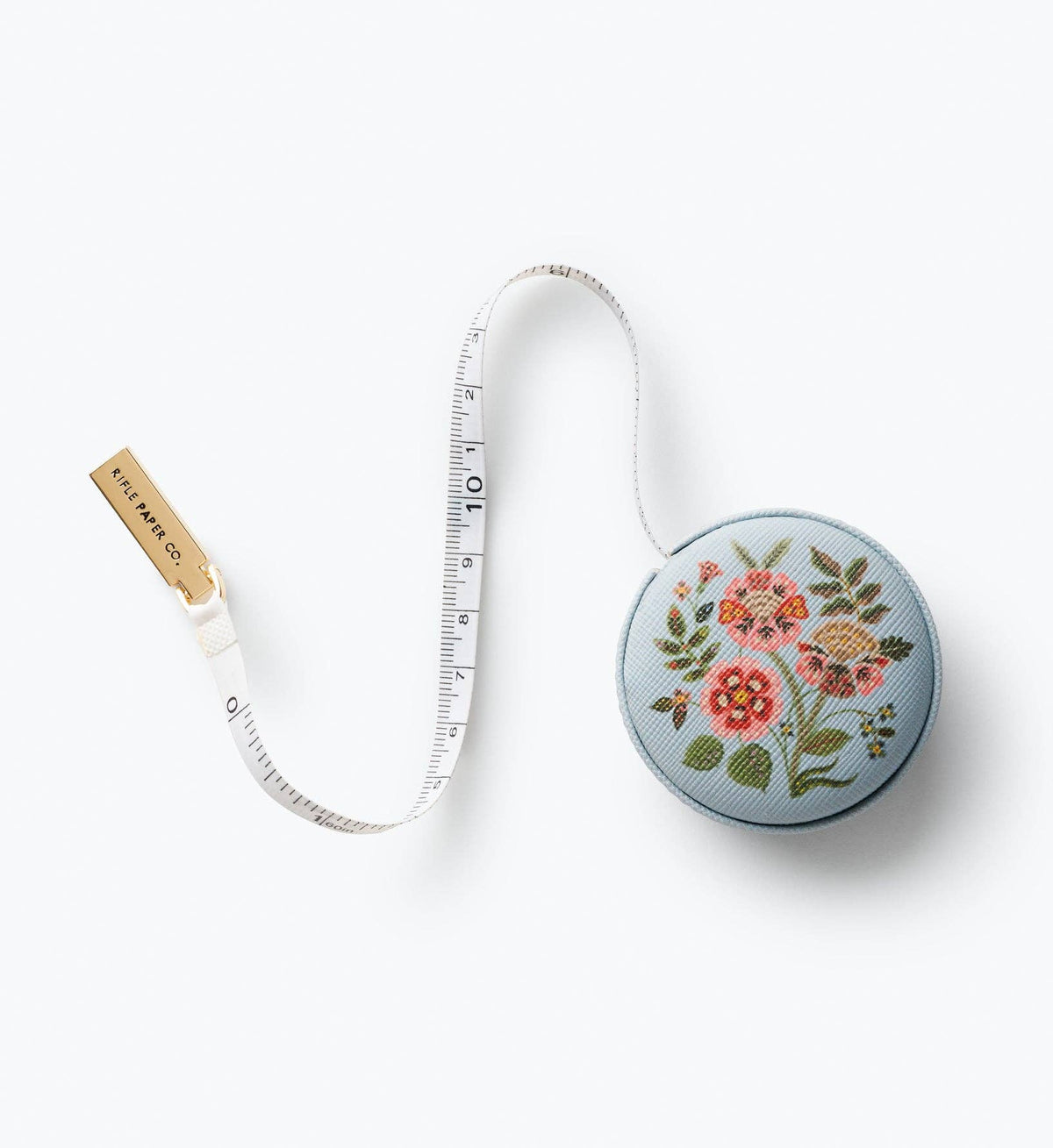 Embroidered floral measuring tape with blue round case and extended tape