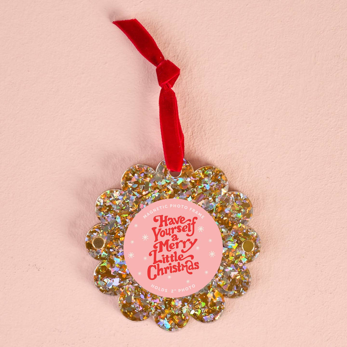 Gold glitter scalloped frame ornament with red ribbon and round holiday photo card