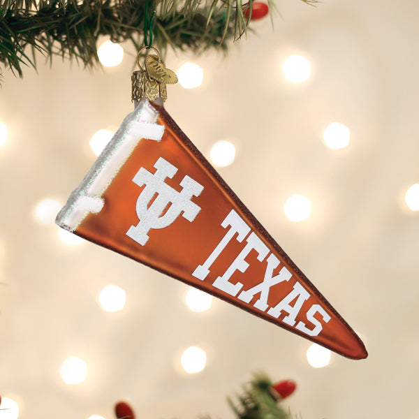 Texas pennant ornament with orange fabric, white UT icon and TEXAS text, hanging