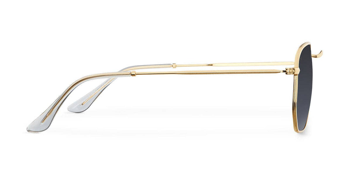 Gold-tone carbon sunglasses side profile with dark lens and hinge detail
