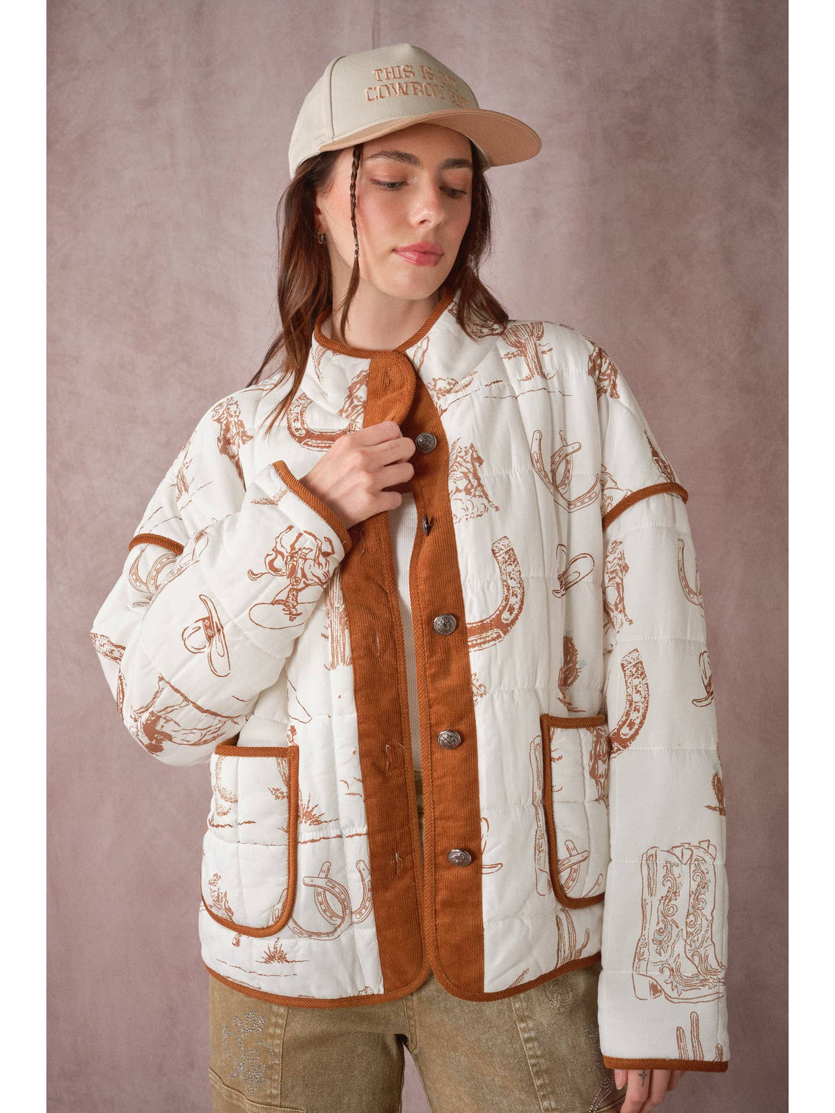 Western quilted jacket, white with cowboy print, brown cord panels, snap front, side pockets