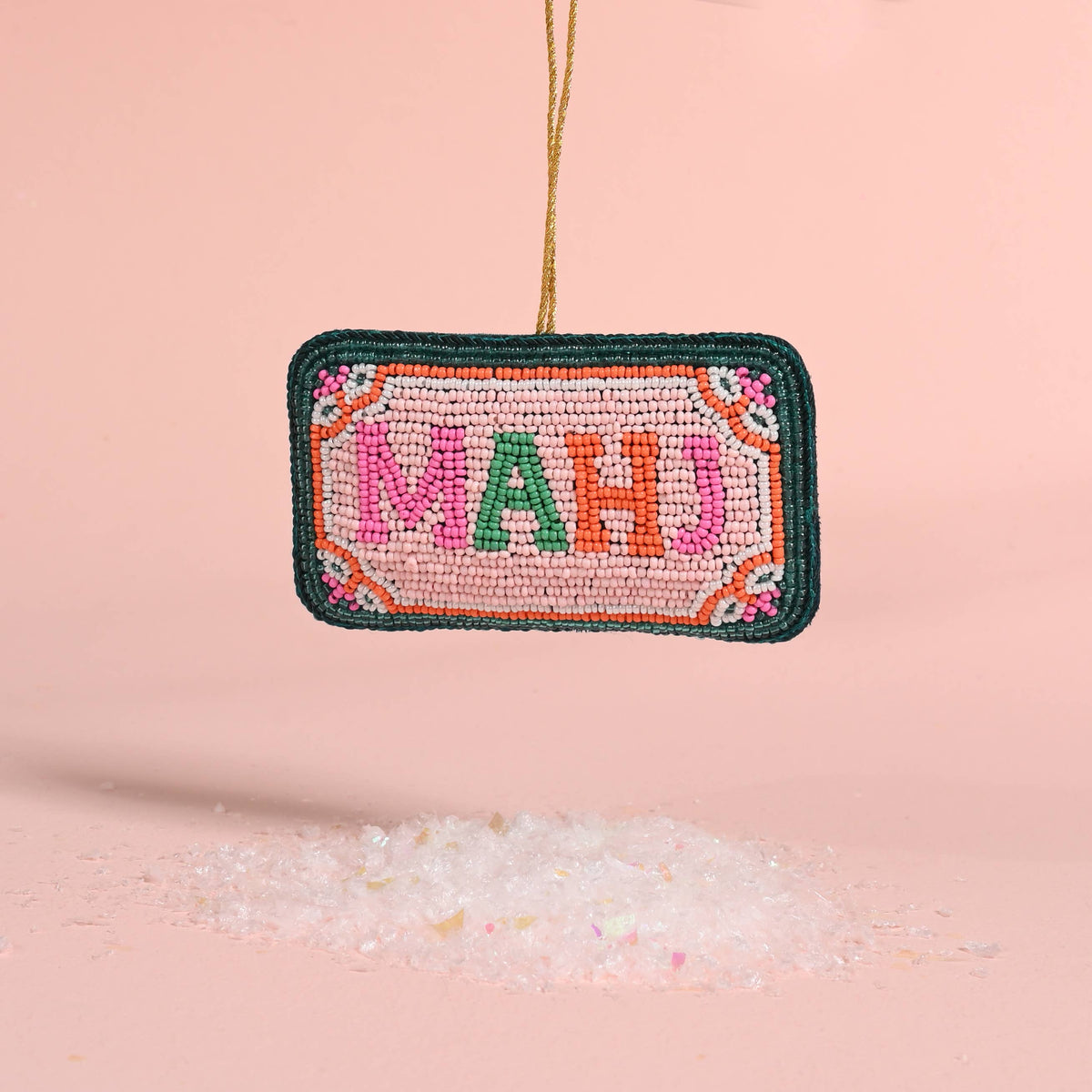 Rectangular beaded ornament with colorful MAHJ lettering and gold hanging loop