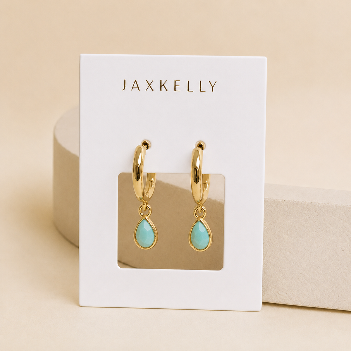 Gold hoop earrings with teardrop amazonite charms in light blue