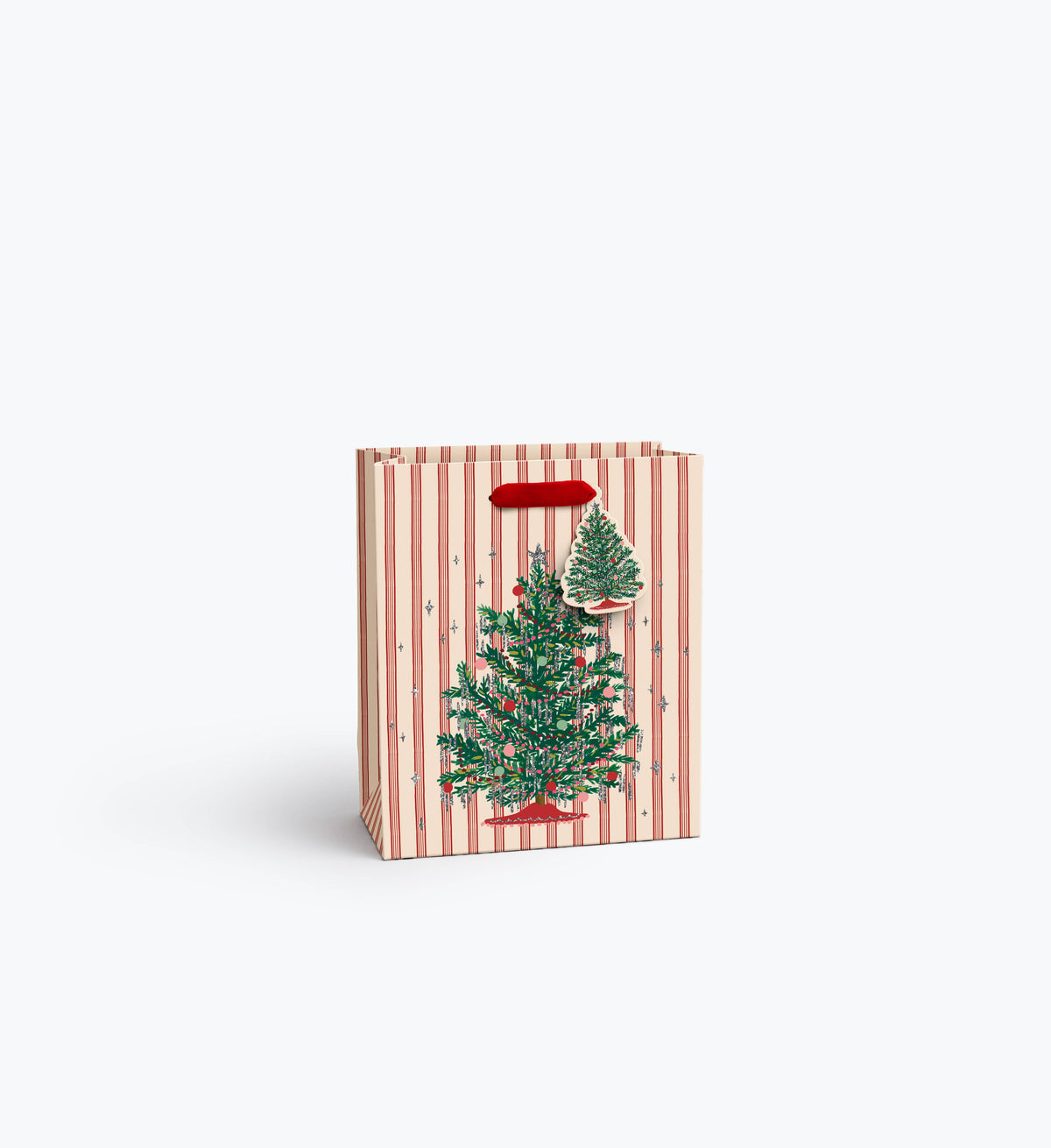 Tinsel tree gift bag with red handle; small Christmas tree scene on striped pink print
