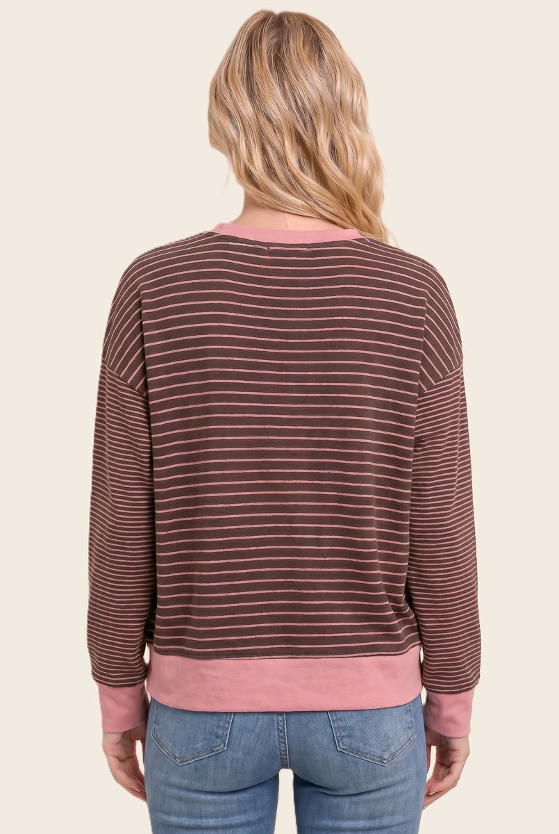 Back view striped sweatshirt in burgundy with thin light stripes and pink ribbed hem