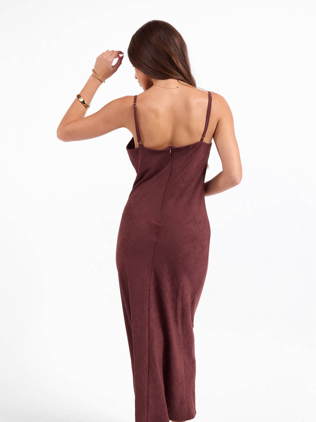 Burgundy back view slip dress with spaghetti straps, fitted midi length.