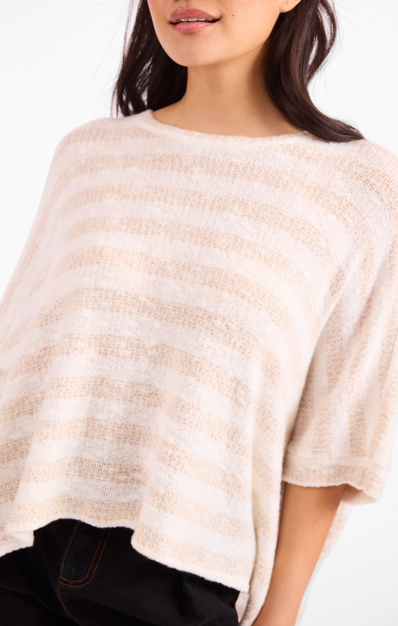 Brushed striped dolman top in light pink knit with crew neck and textured drape