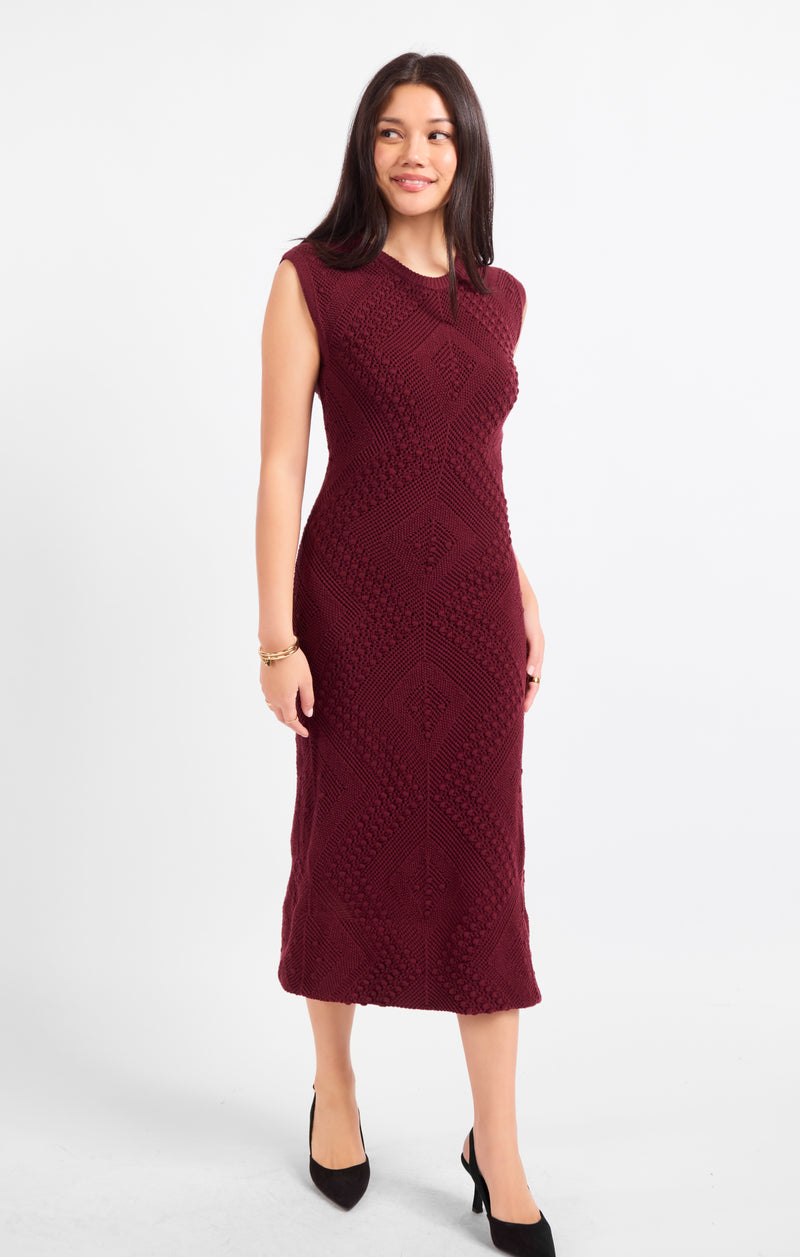 Wandering intricate knit dress in dark maroon, sleeveless crewneck midi sheath