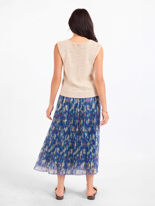 Oatmeal sleeveless sweater vest from back, crew neckline, textured knit hem.