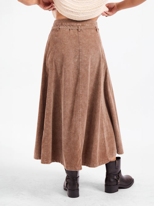 Brown belted midi skirt with A-line pleated hem and stitched panel seams