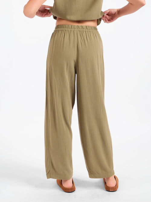 Olive green wide-leg drawstring pants with relaxed drape