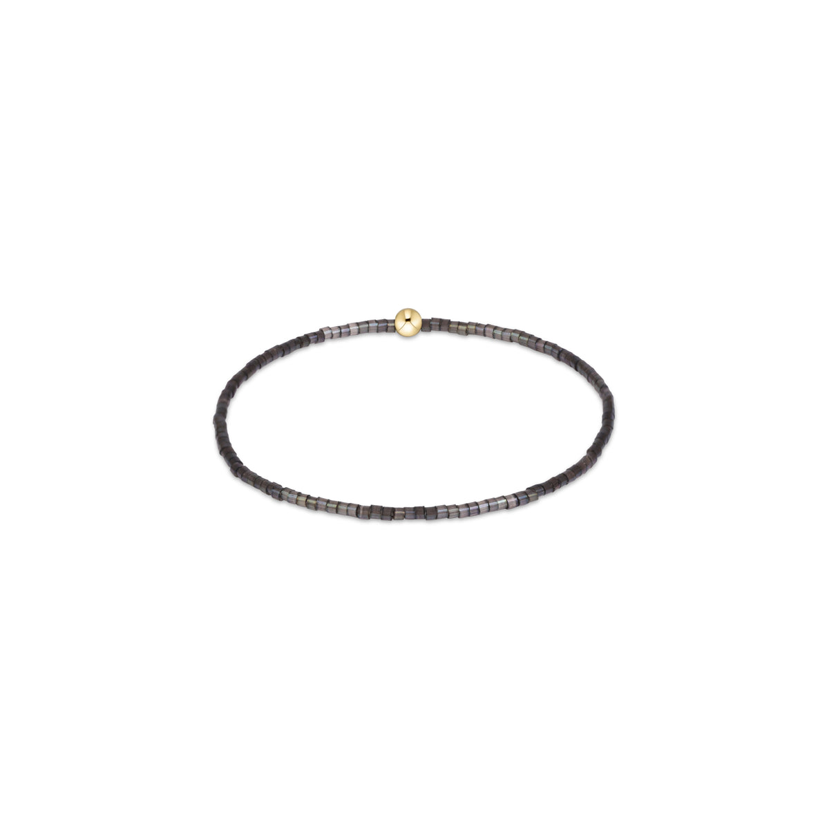Beaded bracelet with dark gray beads and small gold round centerpiece charm