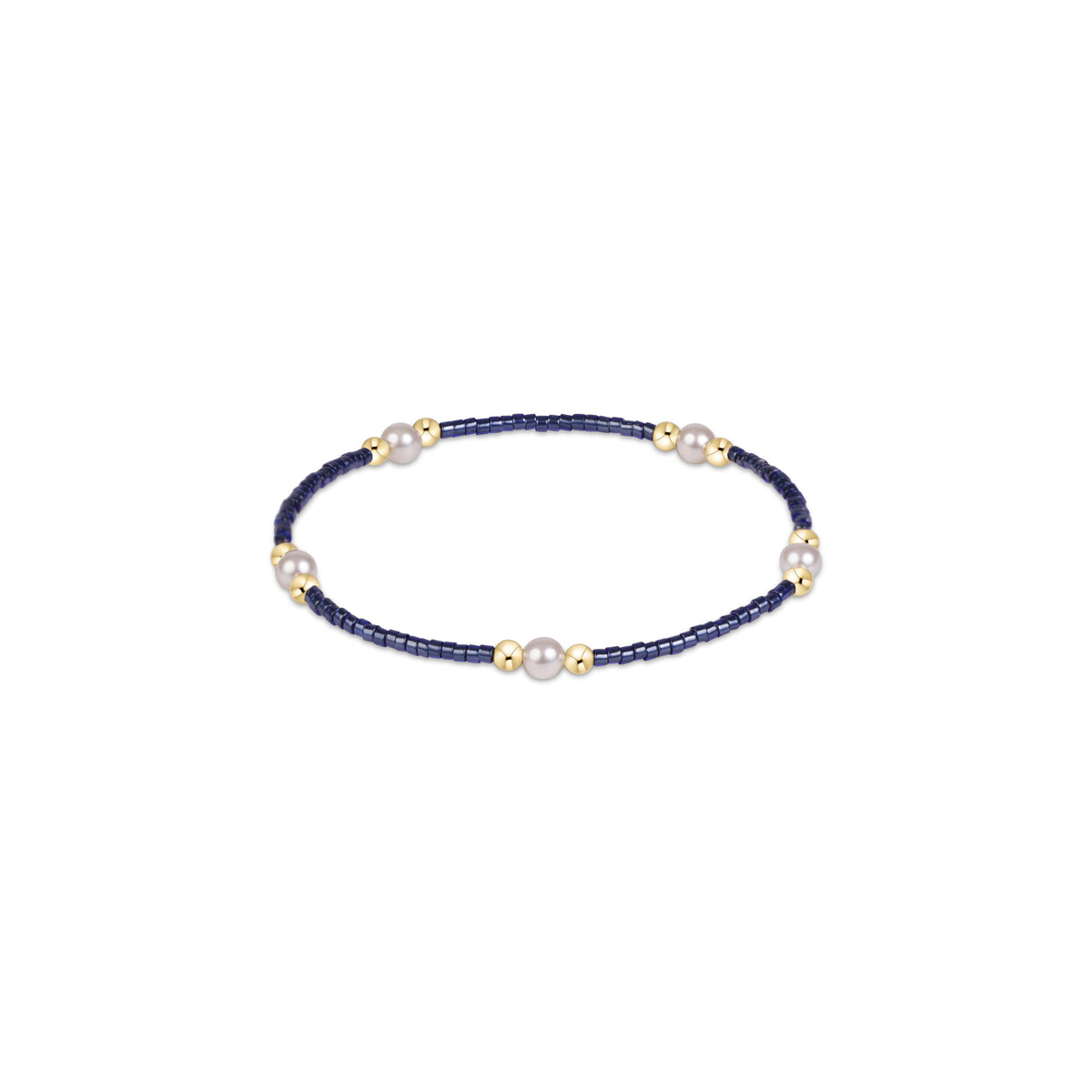 Navy beaded pearl bracelet with white pearls and small gold spacers