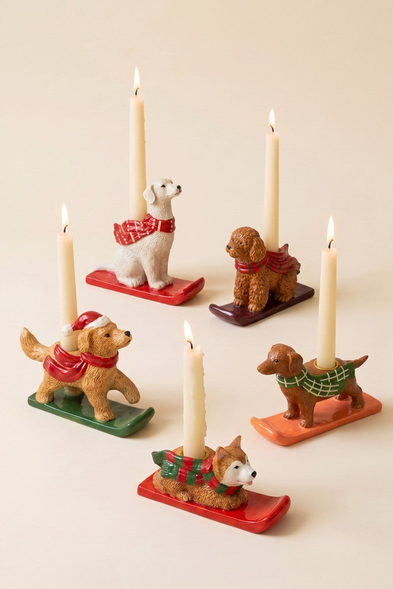 Ceramic dog taper candle holders with taper candles on colored bases