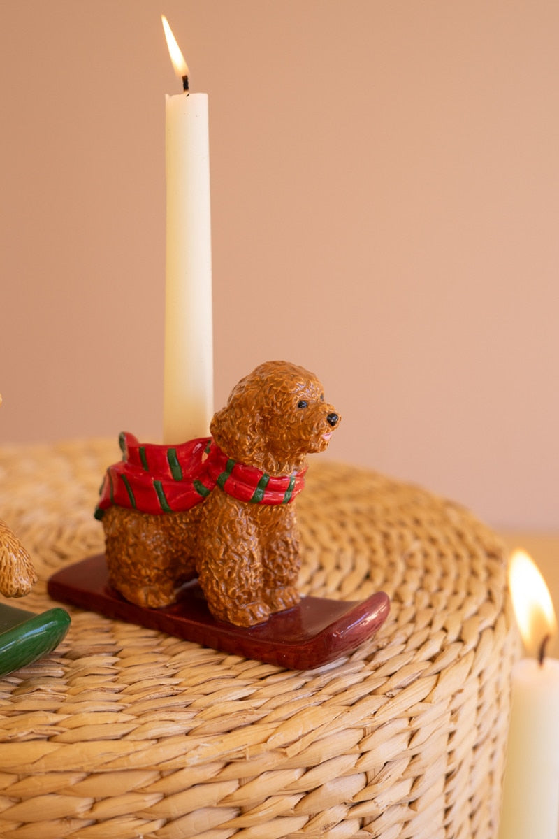 Ceramic dog taper candle holder with red scarf, brown dog on red base