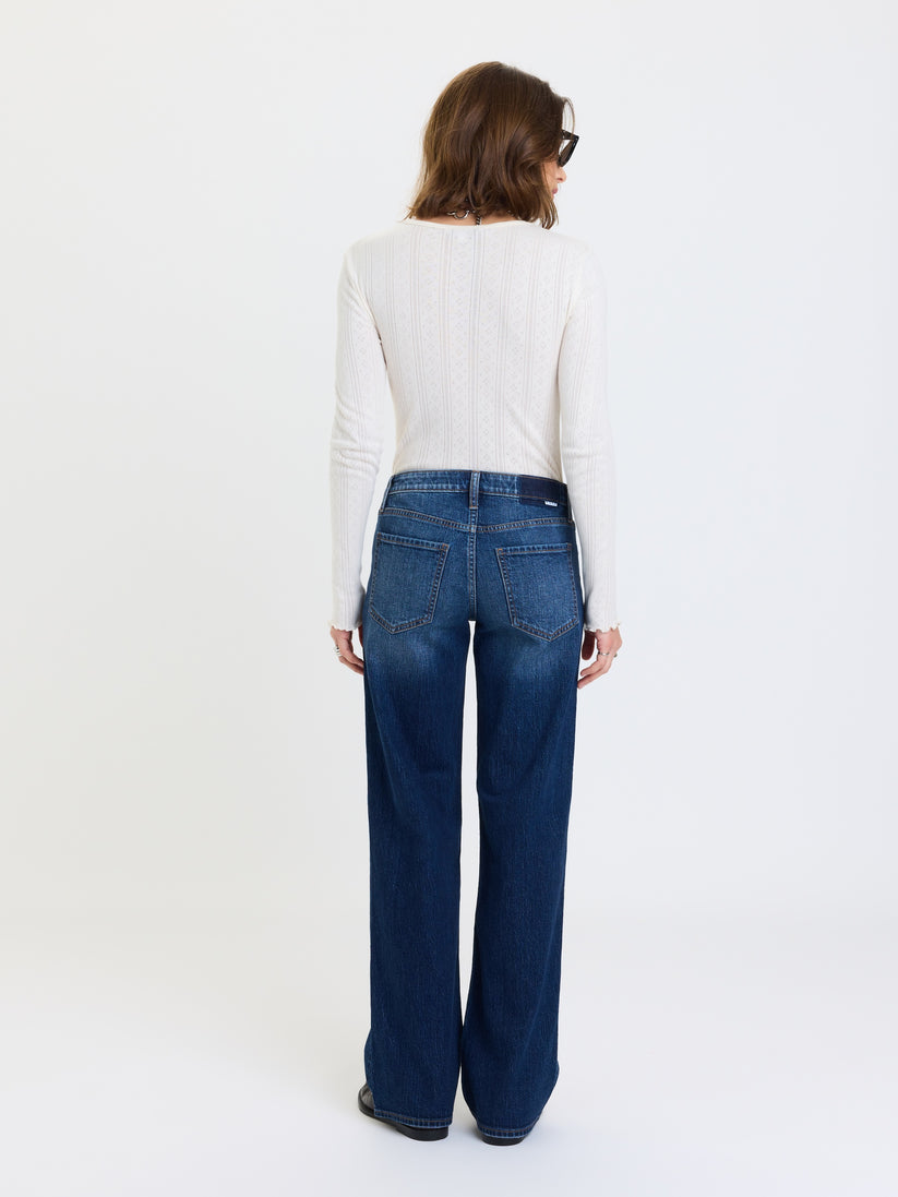 Low-rise straight jeans in dark blue denim, back view with yoke and back pockets