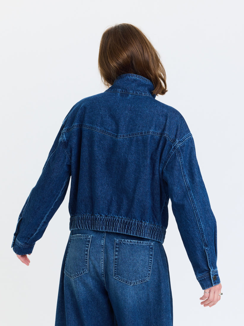 Blue denim funnel-neck jacket, back view with stitched yoke and elastic waist