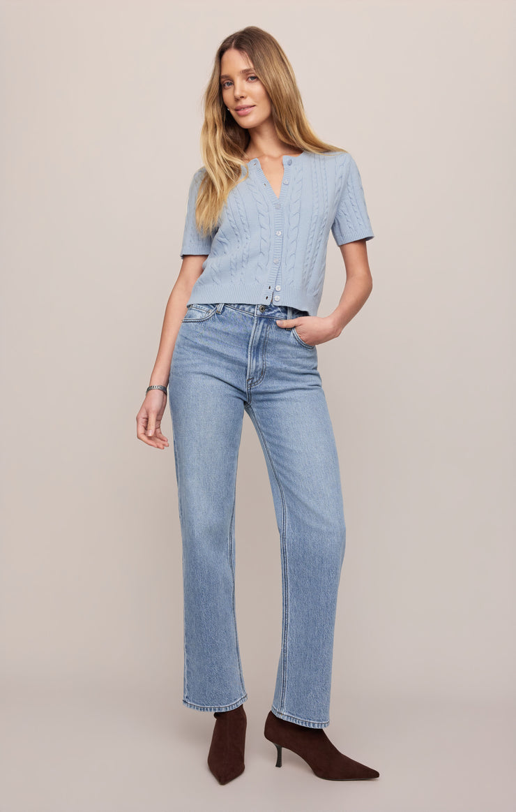 Women’s high-rise light wash straight-leg jeans with five-pocket design.