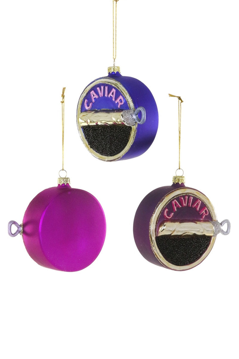 Round caviar ornaments in purple and blue with CAVIAR label, hanging