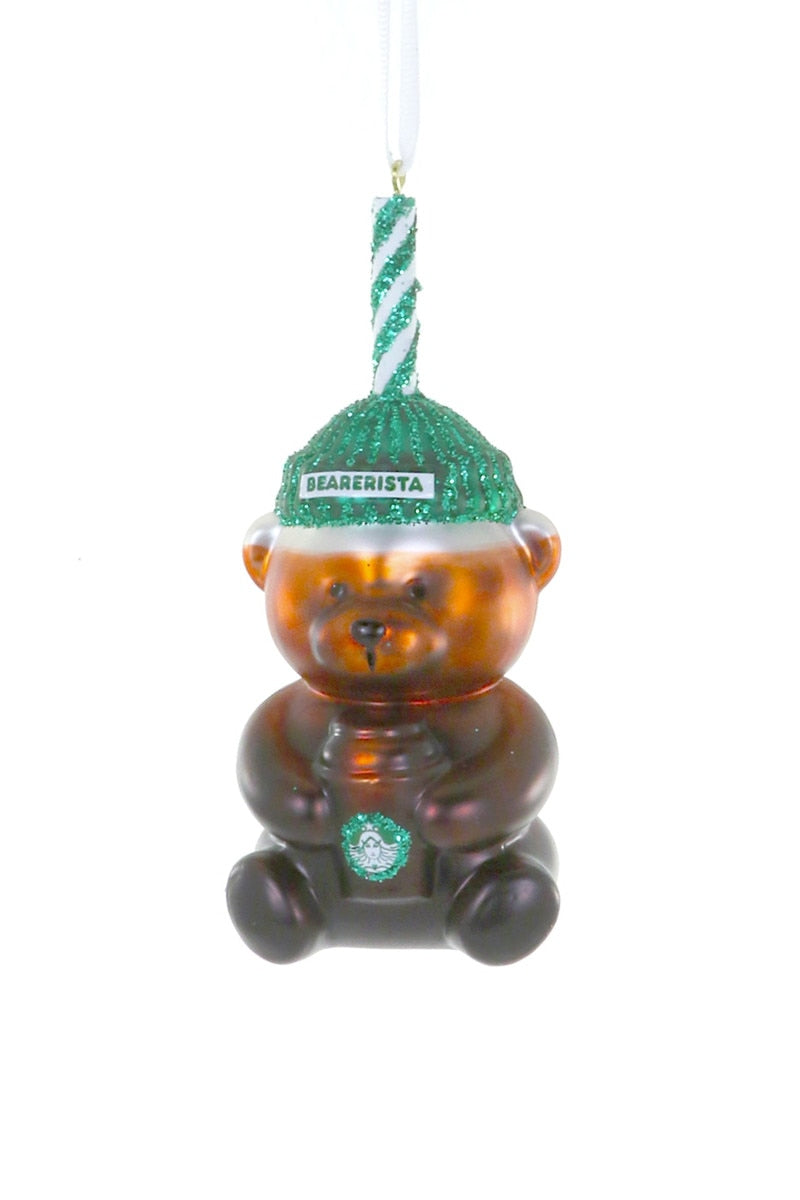 Amber bear-shaped glass ornament with green hat and striped top, hanging loop