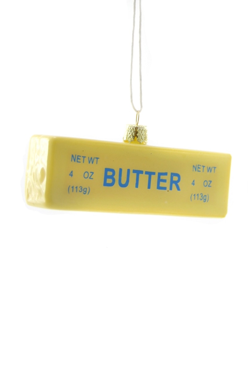 Small butter stick ornament, yellow label reads BUTTER with net wt 4 oz (113g)
