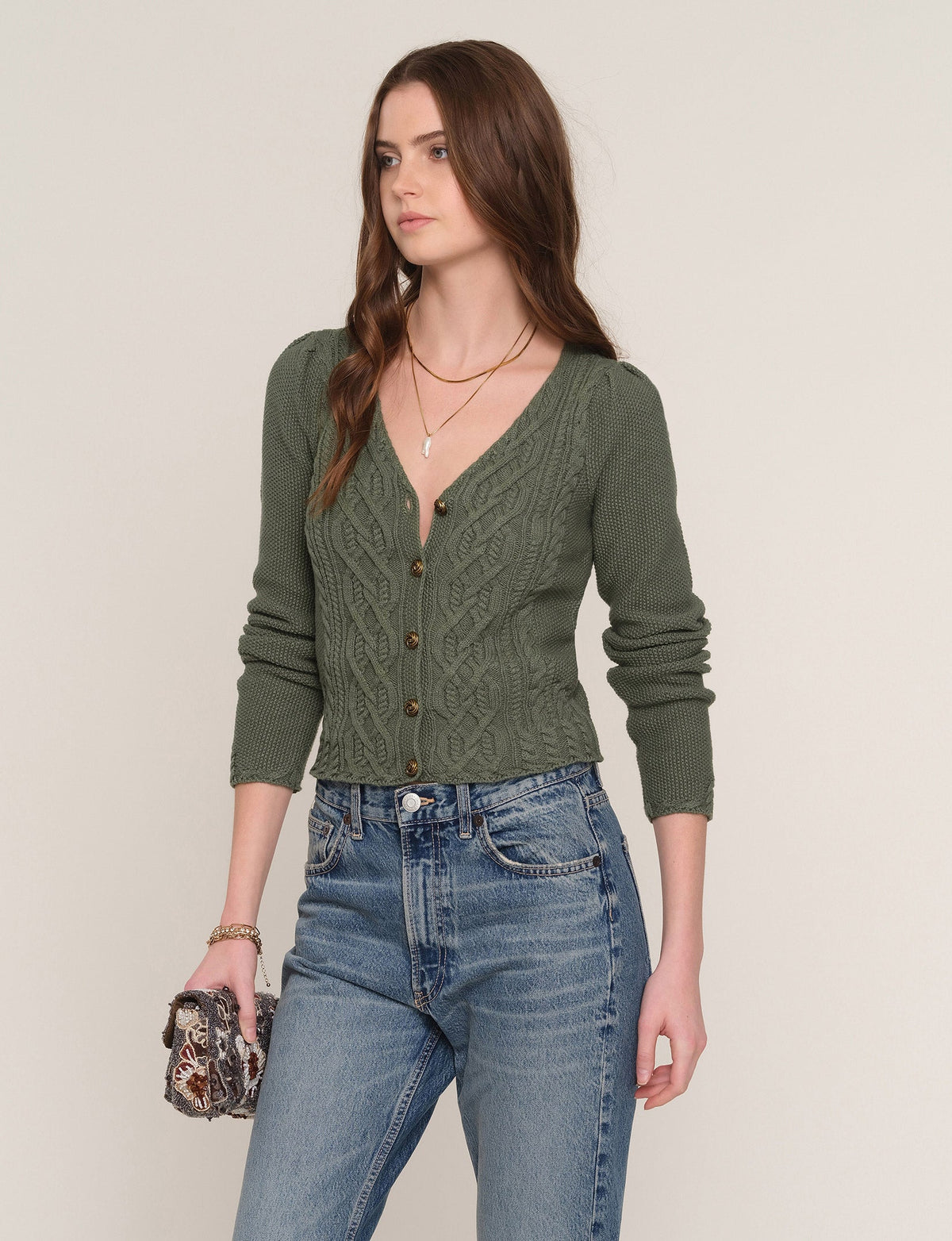 Zephyr green cable-knit V-neck button-front sweater, side view