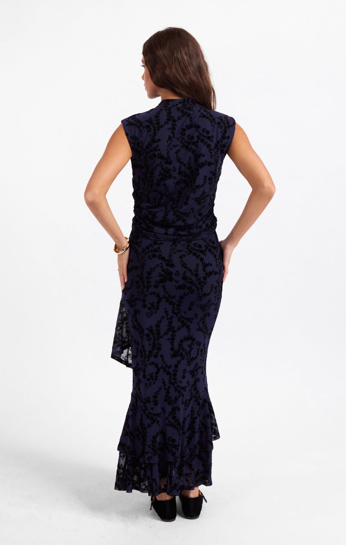 Dark navy sleeveless high-neck mesh top with fitted mermaid hem