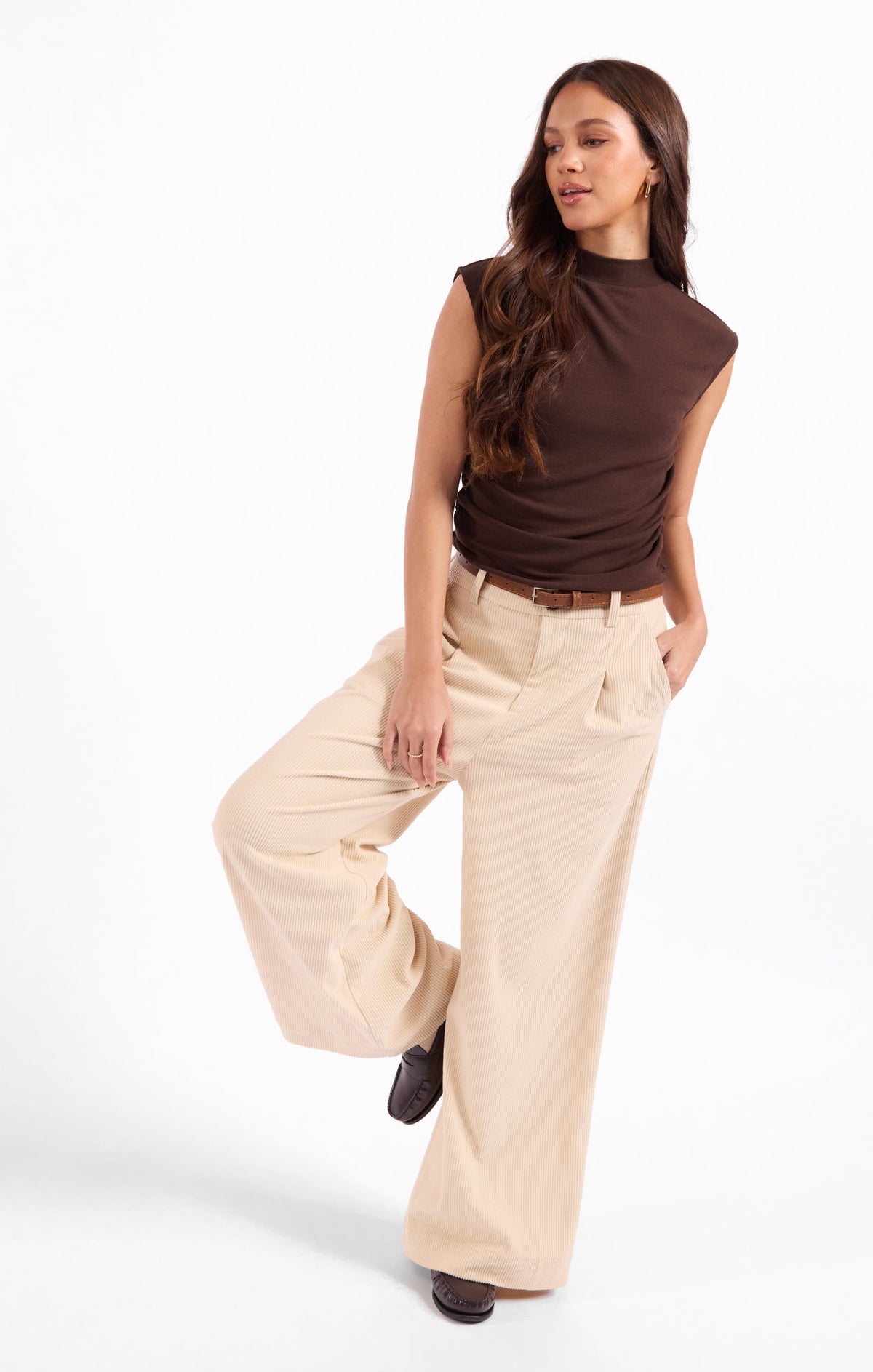 Dark brown mock neck sleeveless tank with gathered drape at the waist