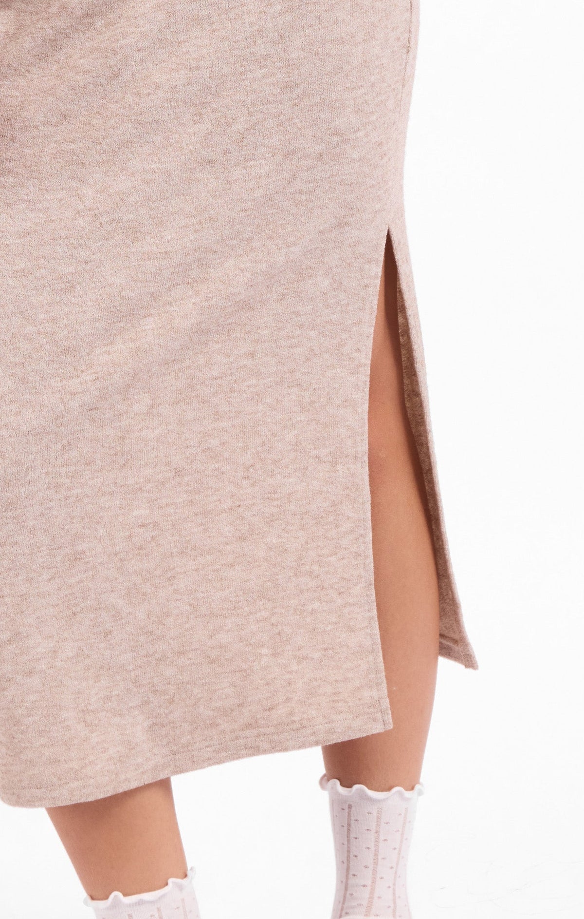 Beige knit midi dress with front slit and angled hem detail