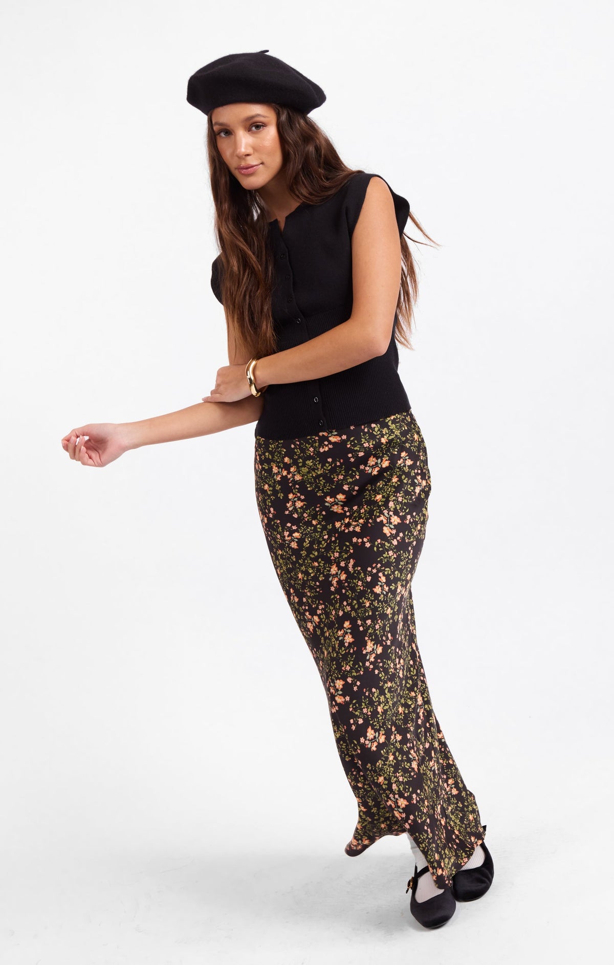 Floral midi skirt with elastic waist, dark base and scattered flower print