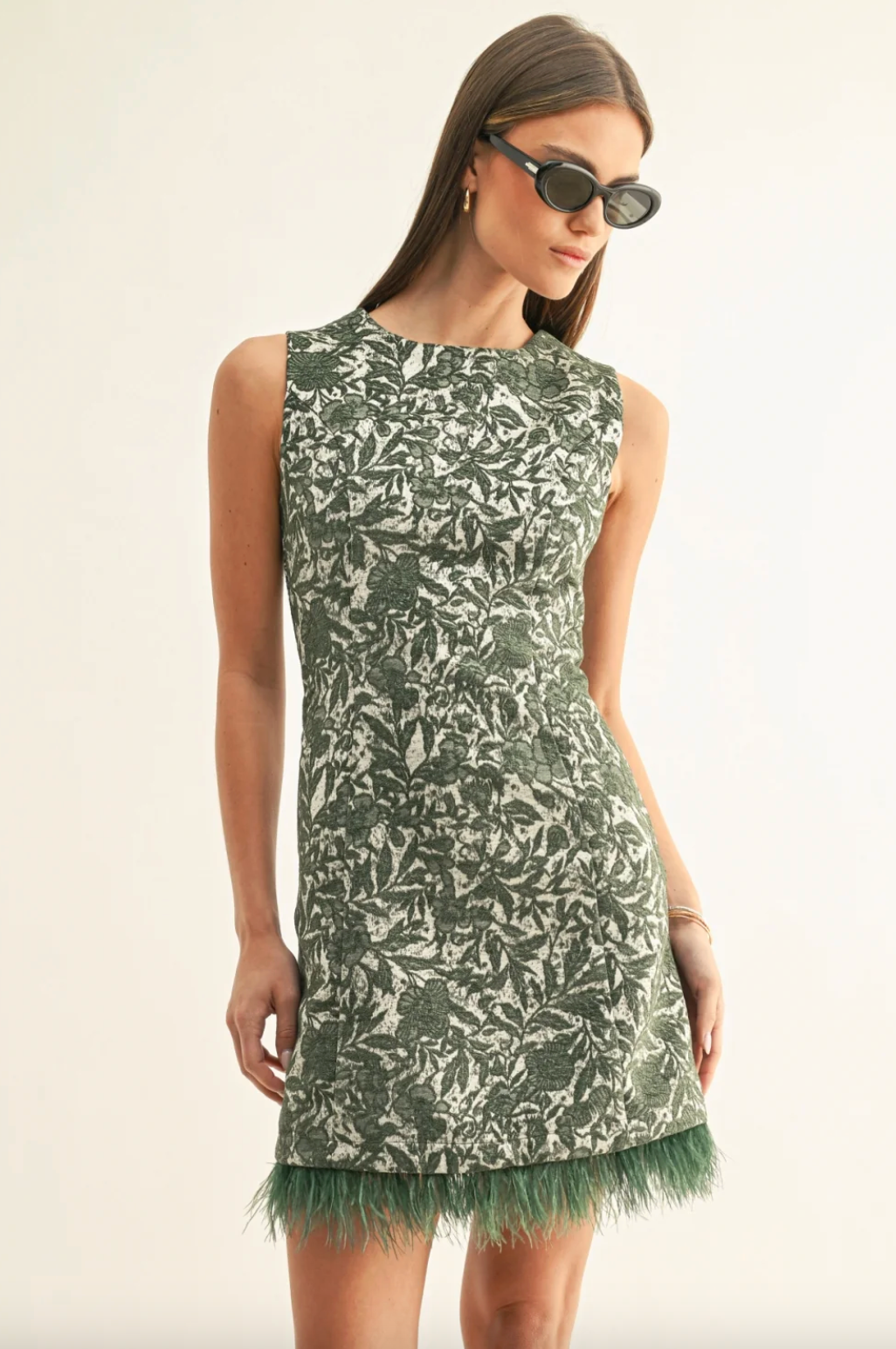 Sleeveless faux feather hem dress, green leaf jacquard, straight shift silhouette