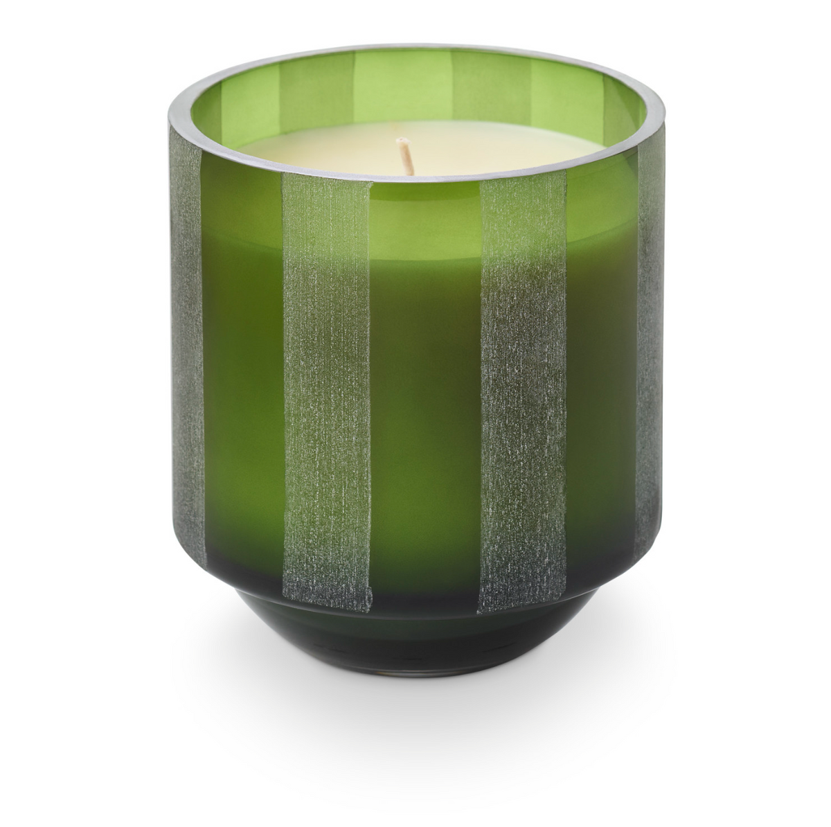 Green etched glass candle holder with vertical striped panels and white wax top