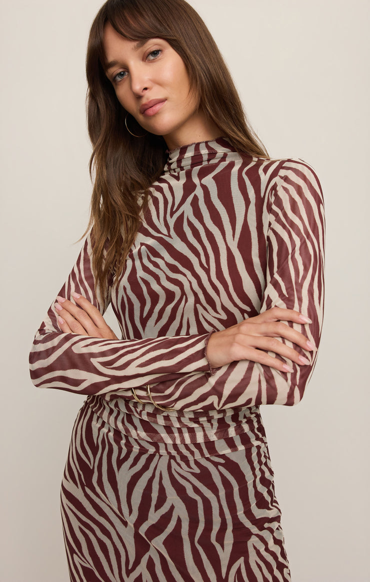 Zebra mesh dress close-up with high collar and long sleeves, burgundy-and-cream print