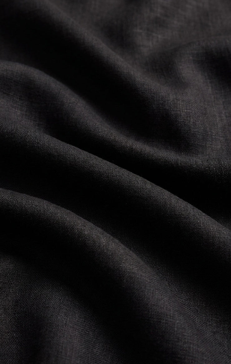 Black woven fabric with subtle diagonal texture