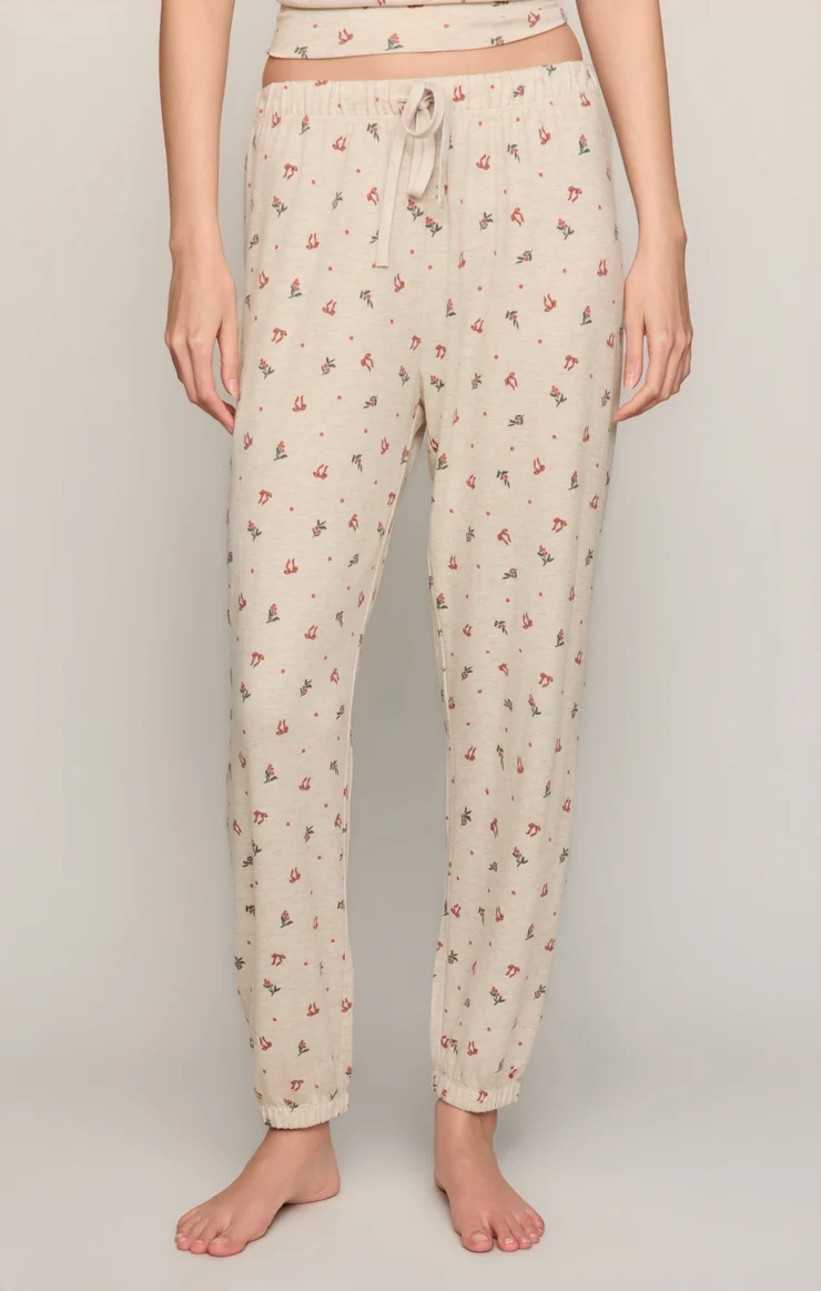 Light oatmeal pajama pants with drawstring waist and cherry bow print
