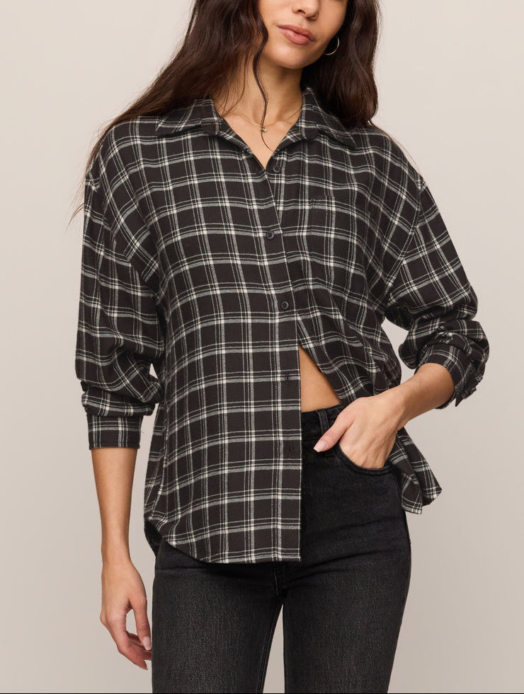Dark plaid button-up shirt with collar, long sleeves, and button front