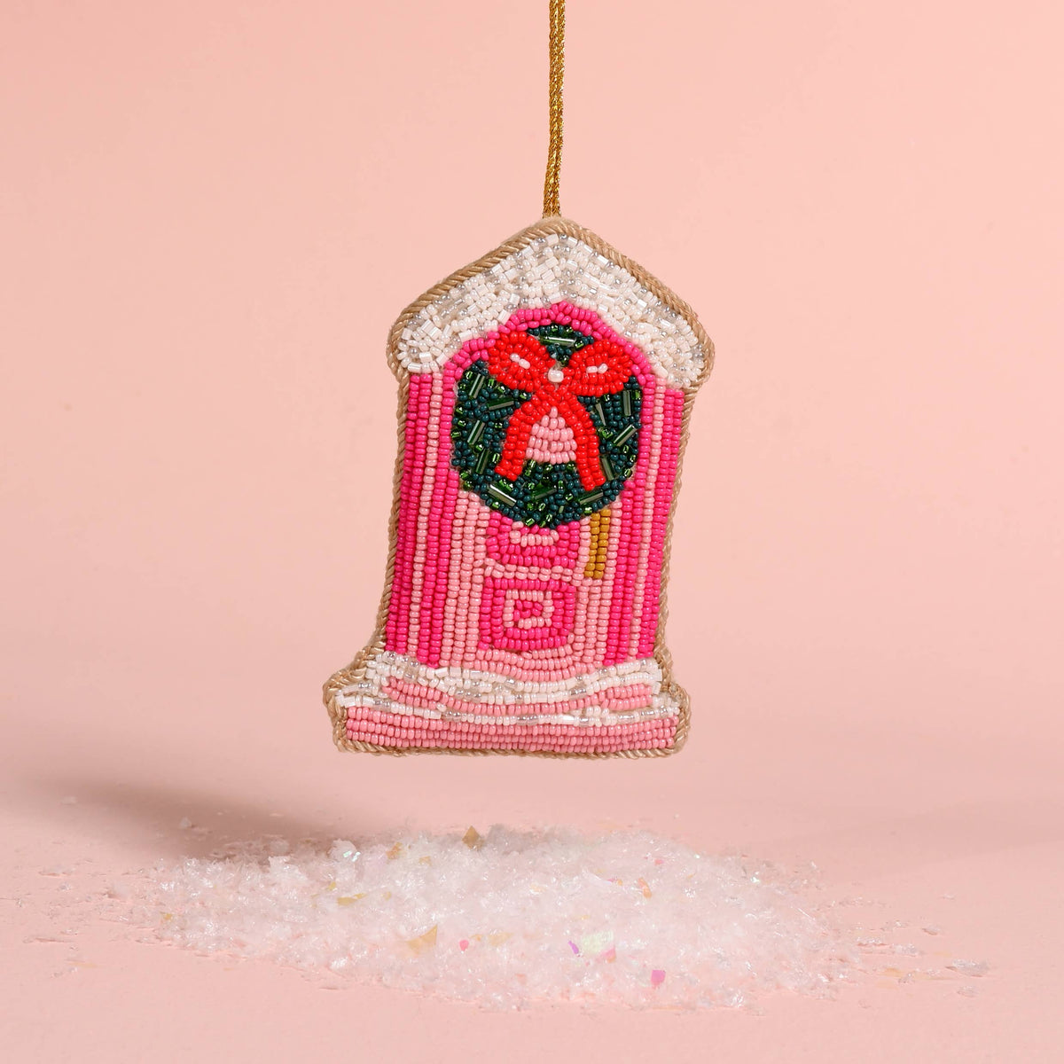 Handcrafted beaded hanging ornament with red wreath, pink-and-cream striped design, gold loop