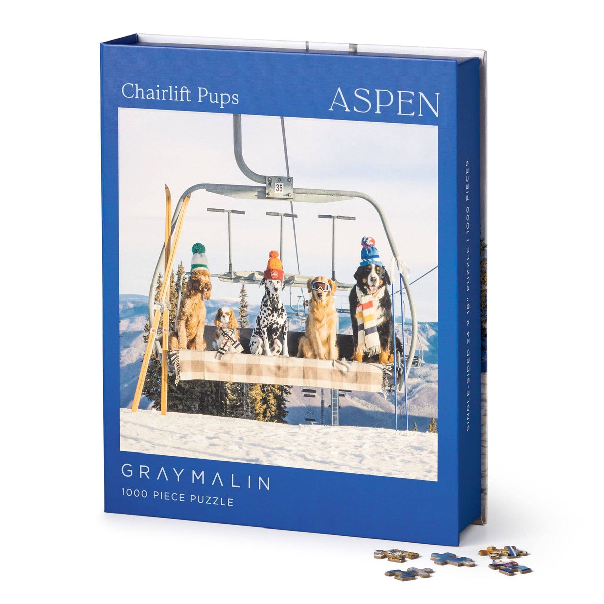 Blue 1000-piece jigsaw box featuring dogs on an Aspen ski chairlift
