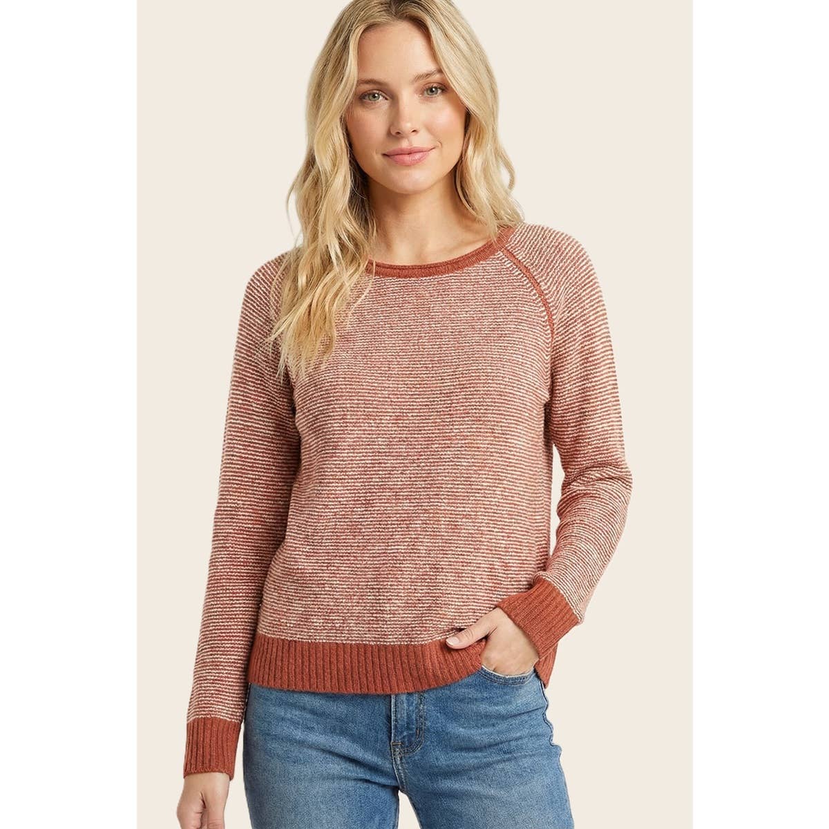 Pinstriped crewneck sweater in rust with long sleeves, ribbed cuffs and hem