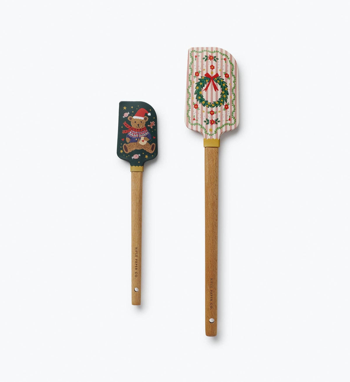 Christmas spatulas set with wooden handles; one dark bear print, one striped wreath print