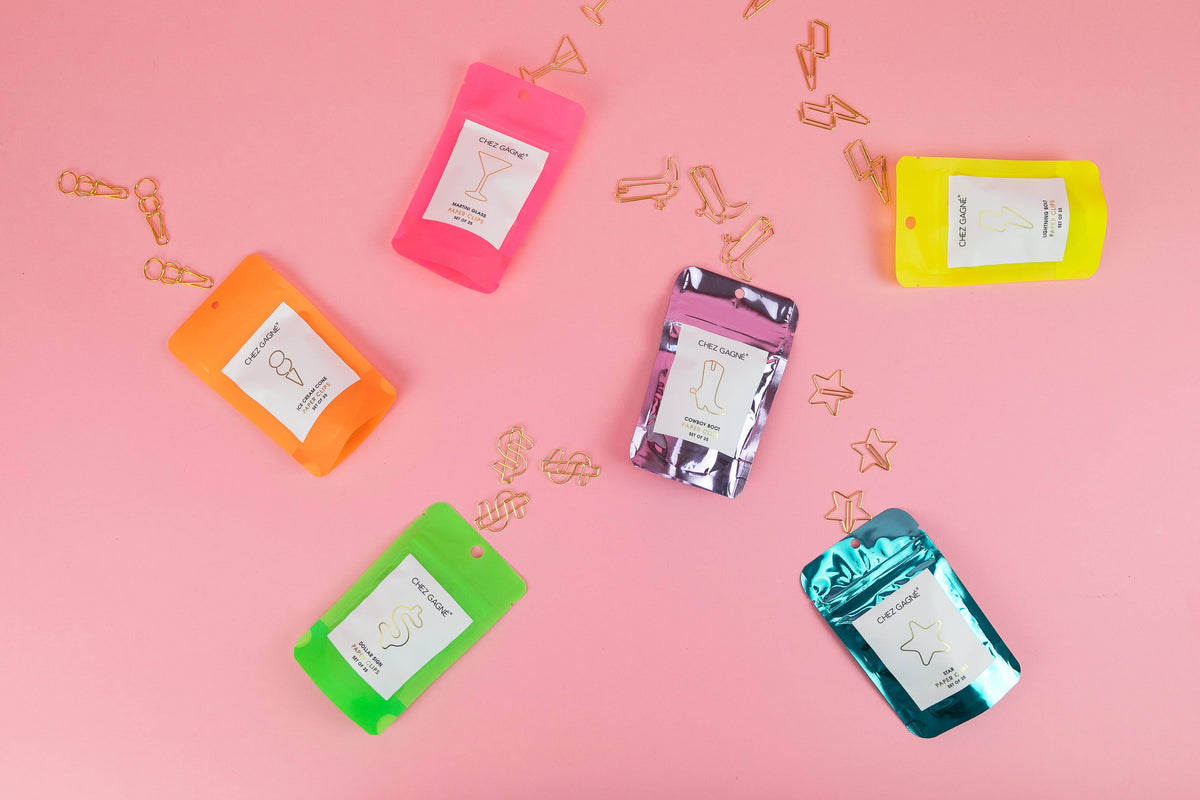 Assorted colored pouches with gold martini glass paper clips
